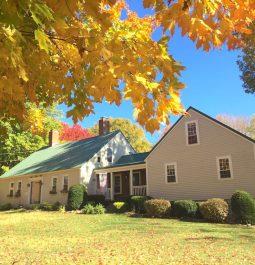 farm surrounded by fall foliage