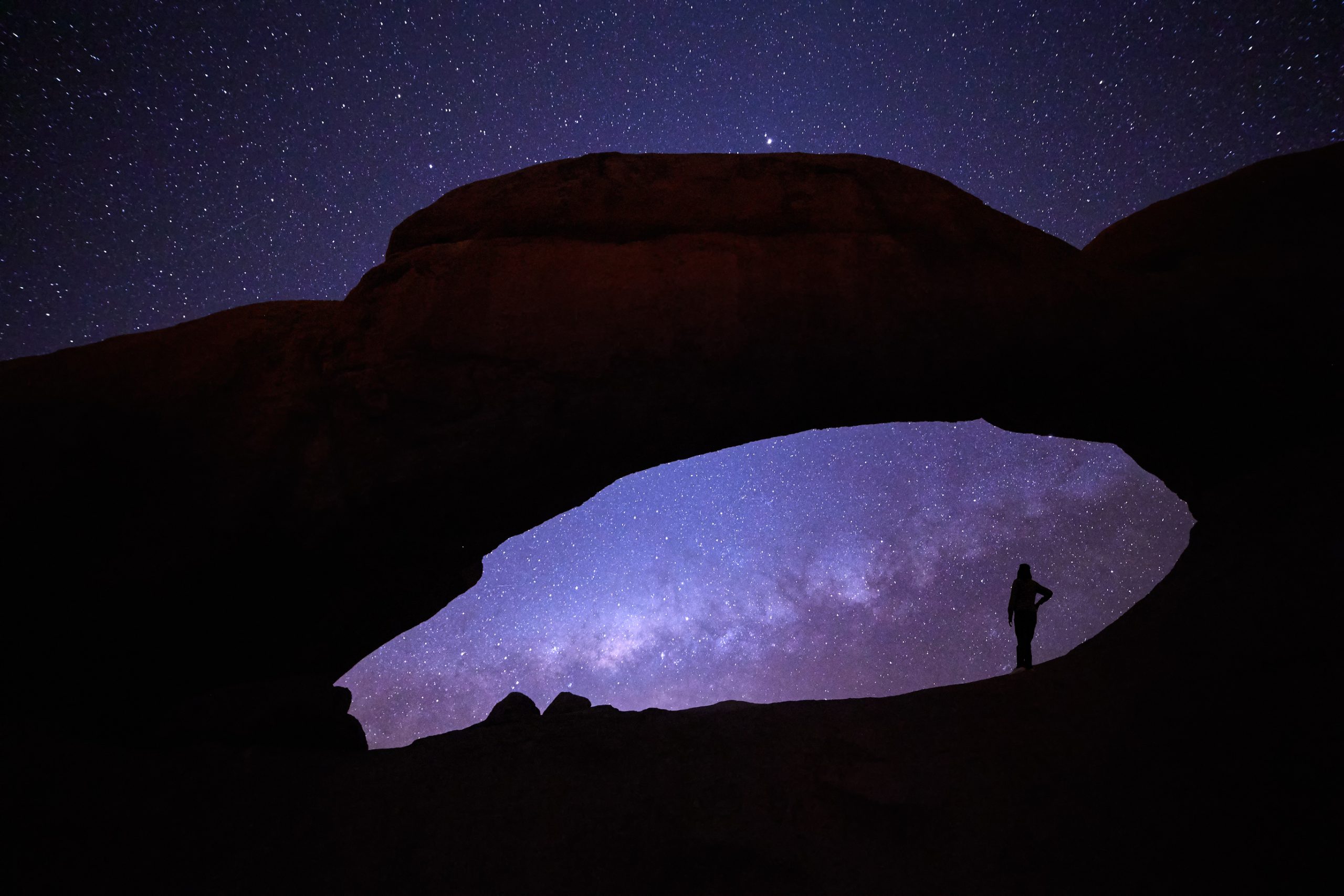 Milky Way viewed through a natural rock arch in Spitzkoppe National Park, Namibia