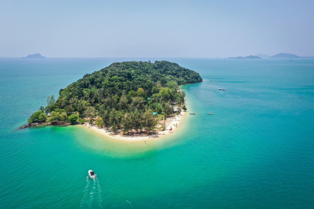 Private island surrounded by azure waters 