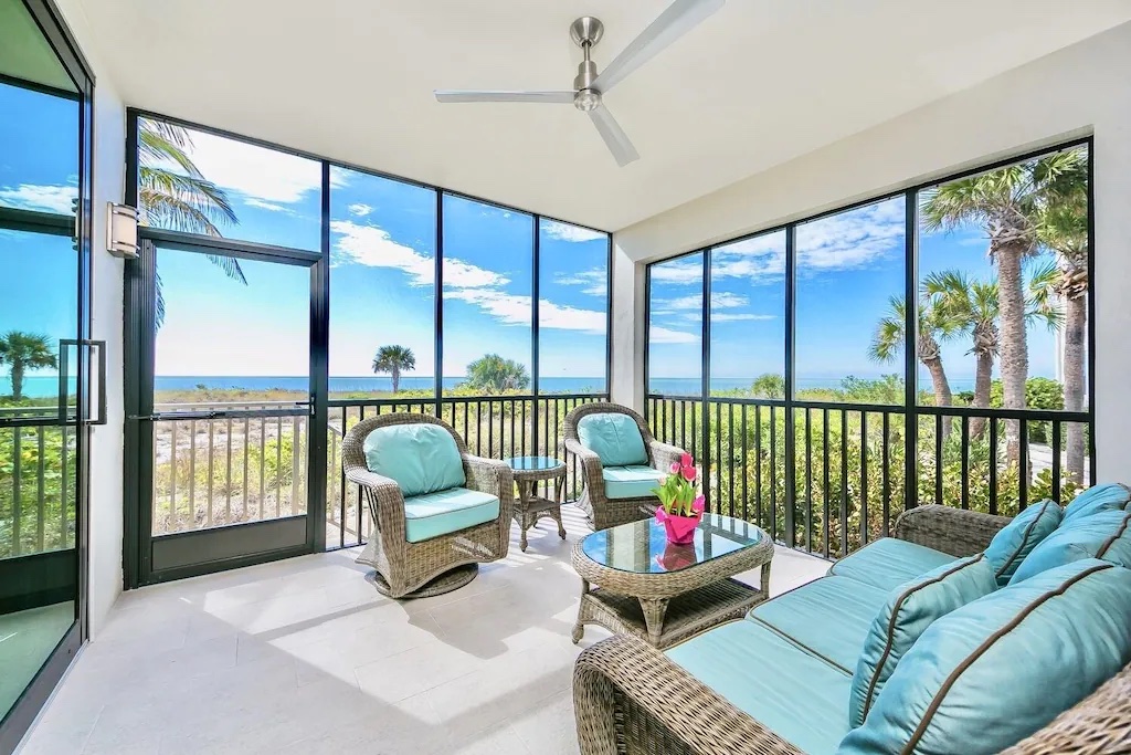 Spacious and airy living room with large windows and sea views