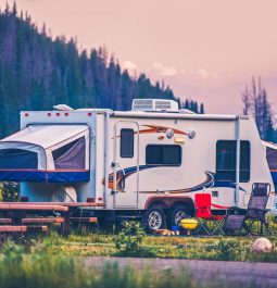 Camper with pop-outs and trees