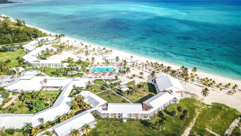 Greenery-covered resort with ocean backdrop