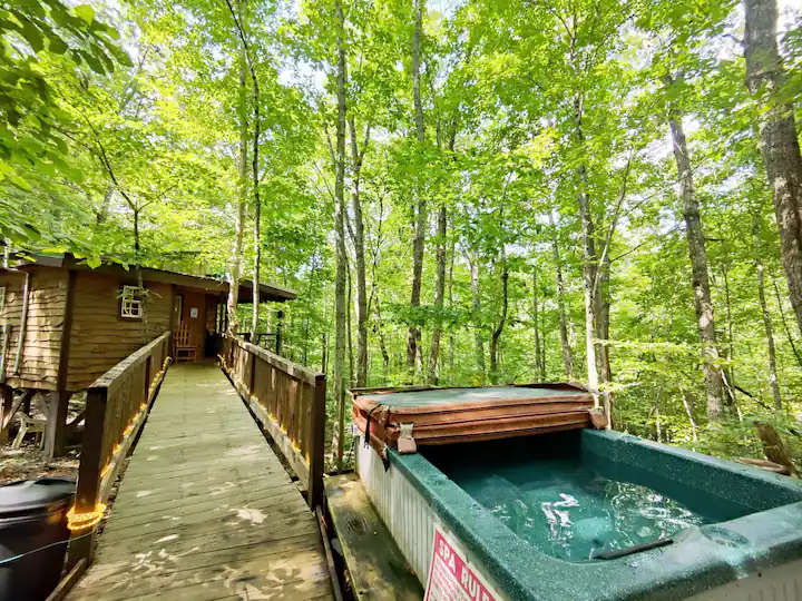 Sleep among the trees and take a refreshing soak in the hot tub