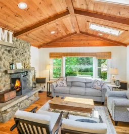 Home interior with wood ceiling and furniture