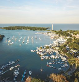 Island harbor with boats seen from above