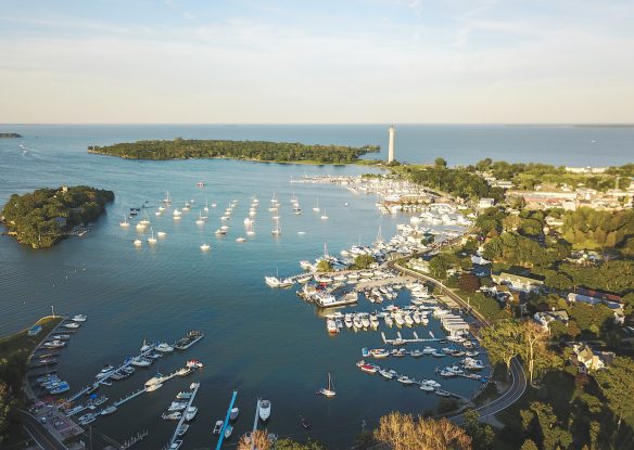 Island harbor with boats seen from above