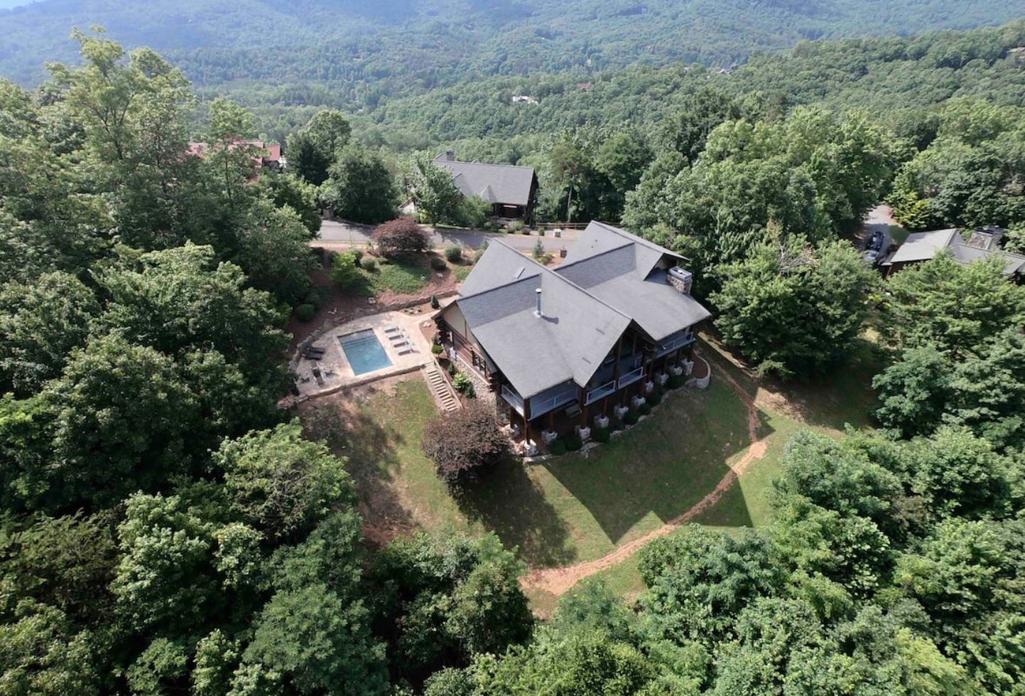 This mountain home has a heated hot tub and spectacular views