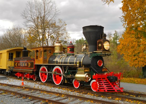 Old steam train and the fall foliage