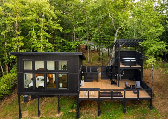 Aerial view of the cabin with a hot tub