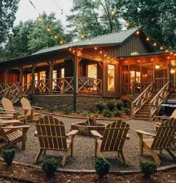 Chairs at fire pit by cabin