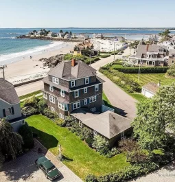 Aerial view of home by ocean