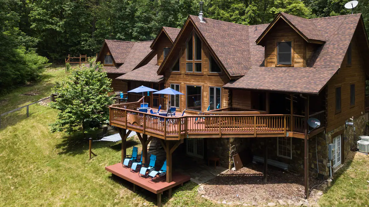 Your very own custom log mansion with game room