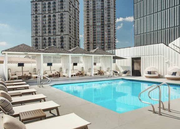 Pool with skyscrapers in background