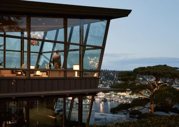 restaurant with glass walls overlooking harbor