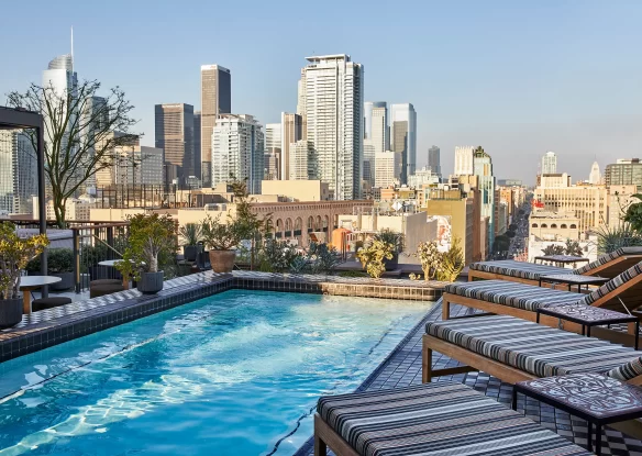 Hotel pool deck with a Downtown LA view