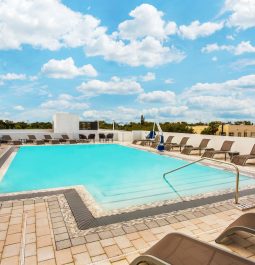 Outdoor rooftop pool of an airport hotel