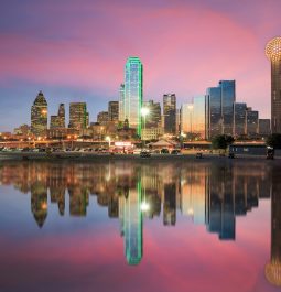 Dallas skyline reflected in Trinity river at sunset