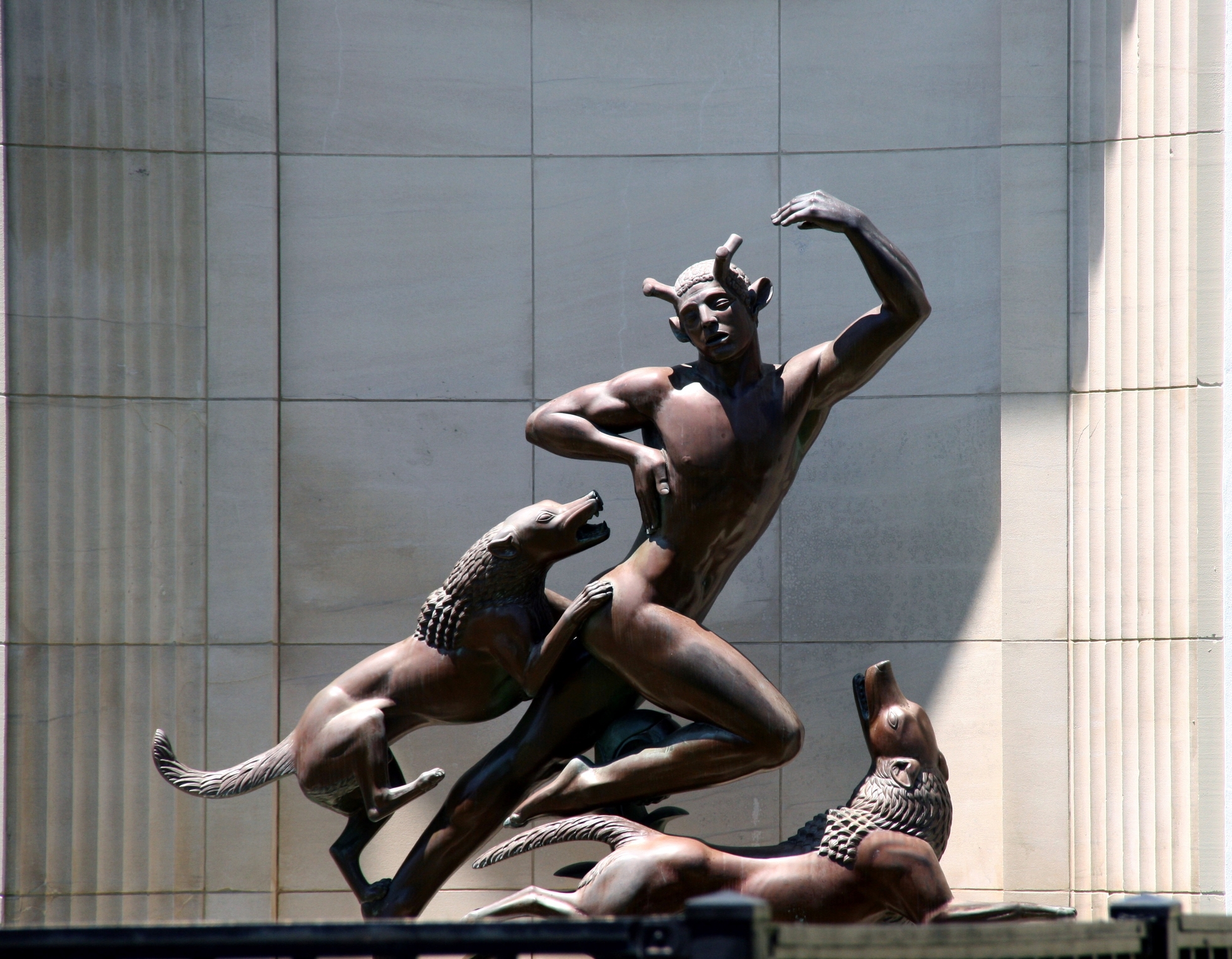 Art deco sculpture in front of the Norton Museum of Art representing a faun and two wild beast