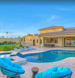 Pool and outside seating by rental home