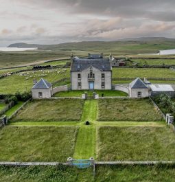 magnificent hotel surrounded by water and rural countryside