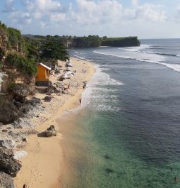 Beach with bright and dark blue water