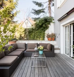 Outdoor garden terrace with a sofa