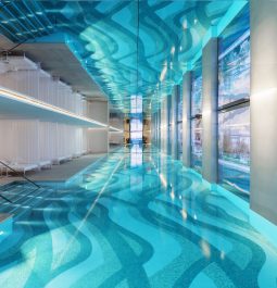 View of an indoor pool at a hotel spa