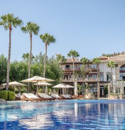 Outdoor pool next to the resort building