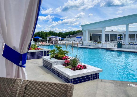 Luxury pool area with seating