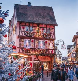 People are walking in the Old Town with Christmas decorations